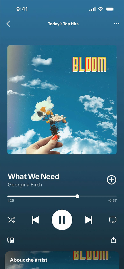 Spotify in-feed display ad example on the Spotify Player showing a Bloom brand image with tagline and call to action